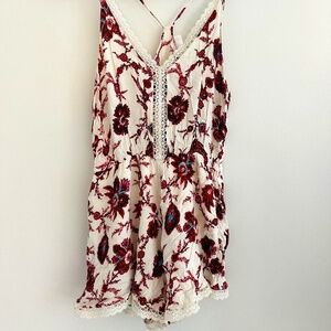 ASTR Cream Racerback Romper with Red Floral Pattern